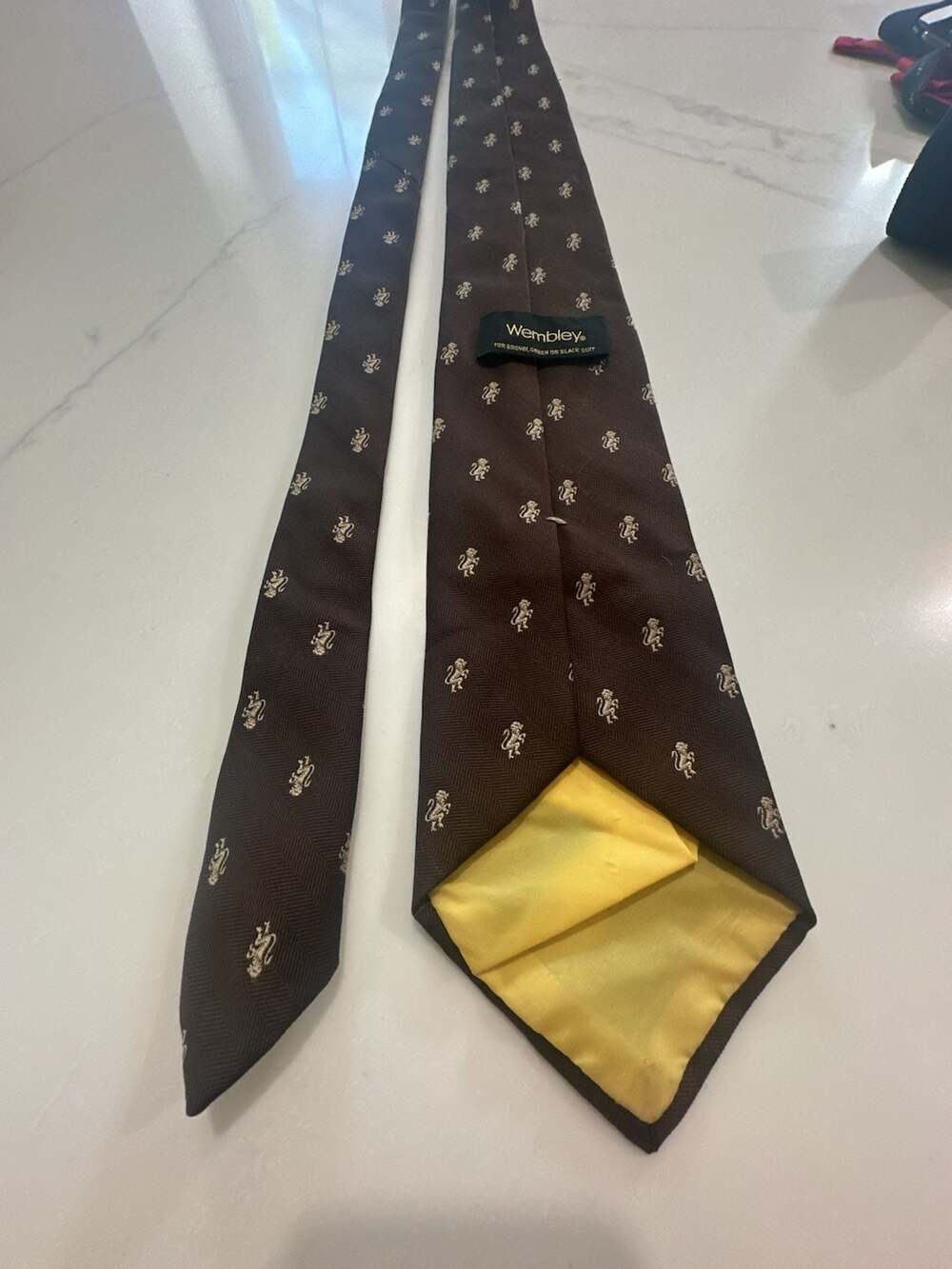 Wembley Vintage Brown Tie with Gold Lion Pattern